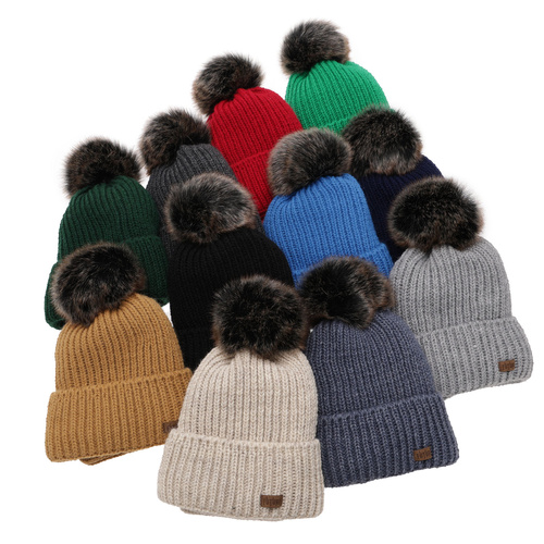 Winterset für Jungen: Mütze und Schlauchschal mit Bommel in Grün Wonder